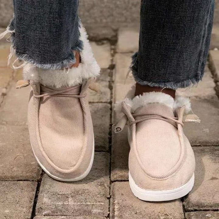 Flache Loafers aus Plüschpelz