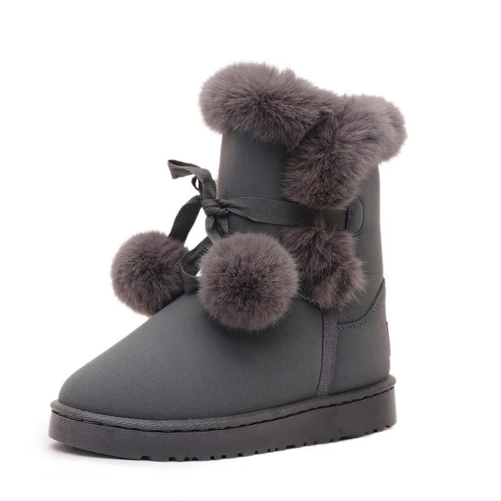 Elegante Winterstiefel mit Pompom-Verzierung