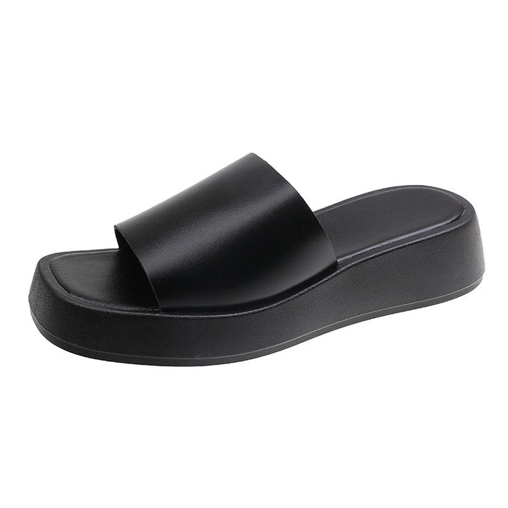 Minimalistische Slide-Sandalen mit breitem Riemen